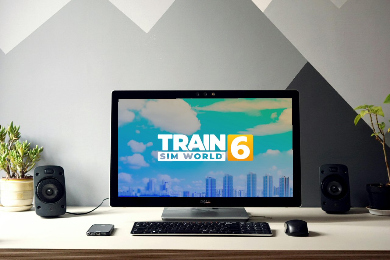 plaatje bureau met laptop met afbeelding Train Sim World 6